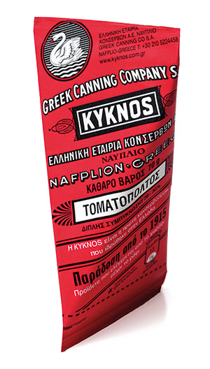One-use paper-packaged  KYKNOS tomato paste in a triangular shape.